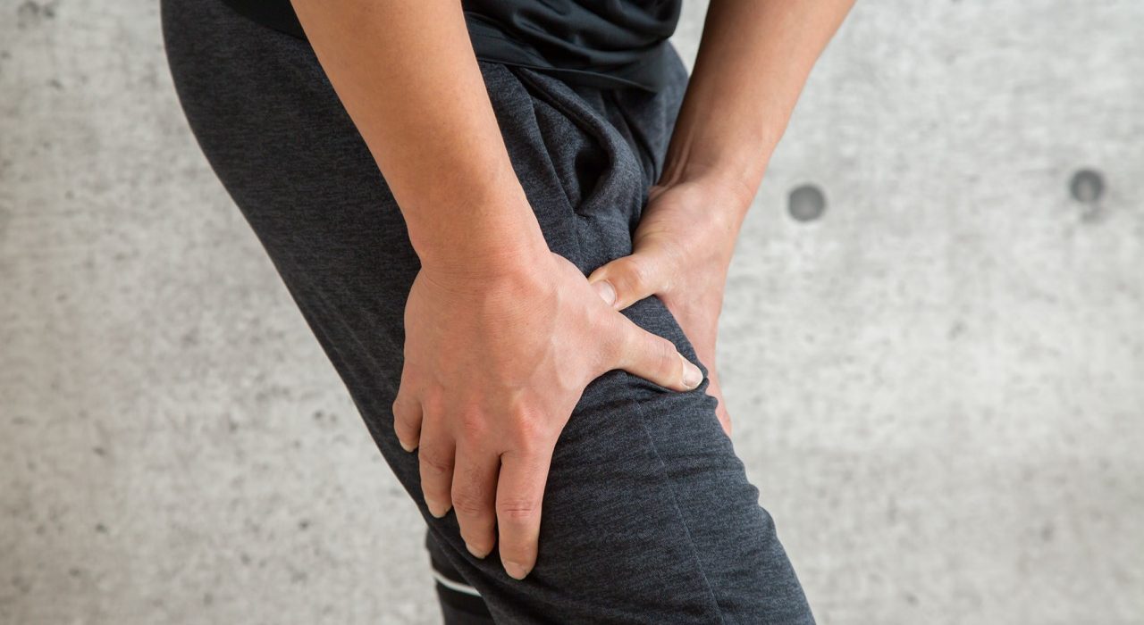 Man participating in a structured exercise walking program outdoors to improve peripheral artery disease symptoms and mobility.